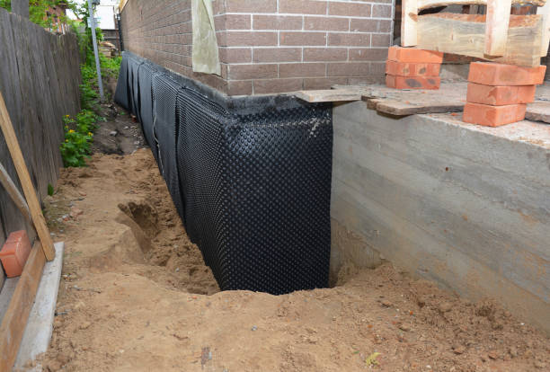 Happy homeowners after waterproofing job in Hauppauge